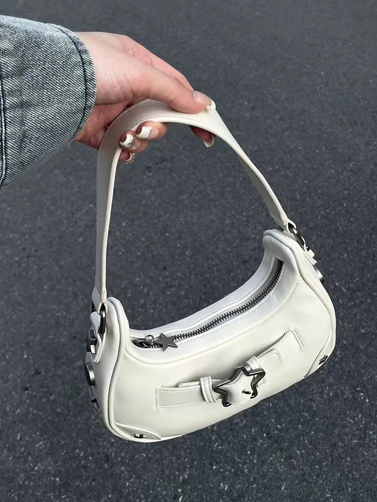 The New 2025 Baguette Bag for Women Is A Trendy Underarm Bag Made of Pu Leather with A Unique Star-shaped Buckle